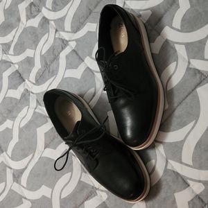 Clarks shoes, real leather, black and white, and size 9.